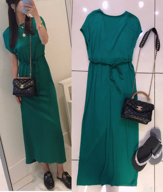 Back cut out green tied dress